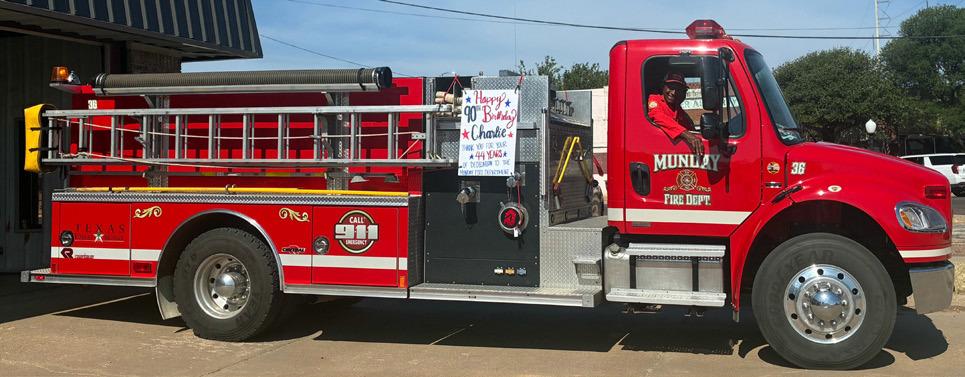 A BIRTHDAY CELEBRATION for 90-year-old Charlie Cooks began with the first vehicle of Munday’s Fourth of July parade. Cooks, a Munday VFD member since 1982, currently serves as chaplain for the department. | COURTESY PHOTO