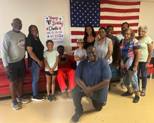 JULY5BIRTHDAY CharlieCooksshowedoffhisplaquesurrounded by family who joined in the celebration of his 90th birthday. Cooks turned 90 on July 5, 2026. | TROY PARTON