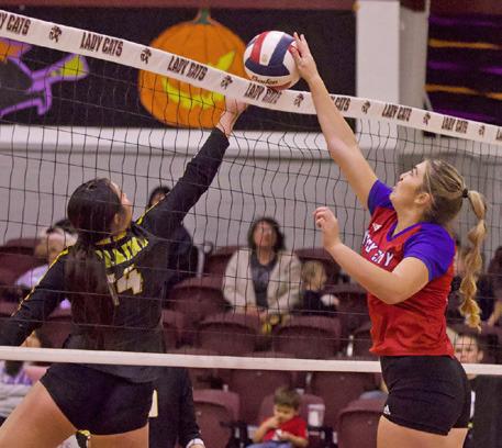 BLOCKING AT THE NET K’Lee Grimsley blocks at the net against Lorraine in last Saturday’s bi-district game. | SHERI BATY PHOTO