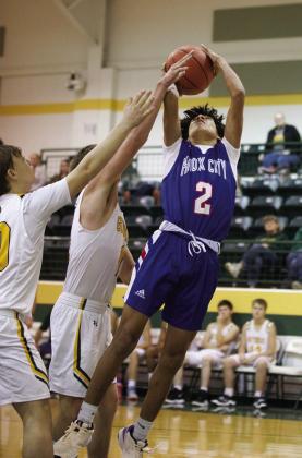 Joe Adam Morelos grabs the rebound. | SHERI BATY PHOTO