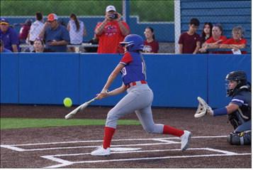 Kinlee Eaton with a base hit. | SHERI BATY PHOTO SALUTE TO HOUNDETTES The Knox City Houndettes softball team season has come to a close. They lost the Area playoffs to the Dodd City Lady Hornets last week. We salute their great season and their playoff run.