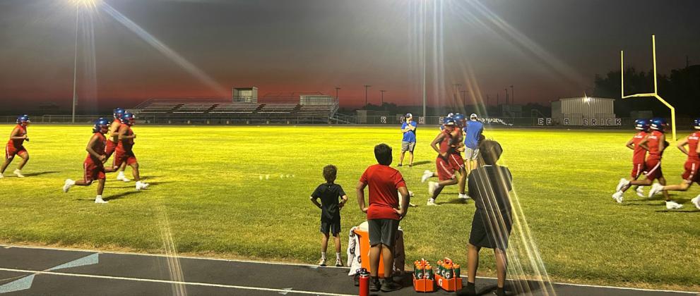 O-DARK-THIRTY Two-a-day practices began forTexas high school athletes Aug. 3.“Run your routes, this is not JH, we can throw further than 15 yards!,” new Benjamin Mustangs head coach Aaron Kuehler instructs his football players in Monday’s early-morning session. MORE PHOTOS OF EACH KNOX COUNTY TEAM, PAGES 4, 5, 6 | TROY PARTON