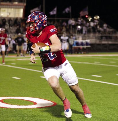 FIRST DOWN John Cross Utley catches the pass and gains some yardage for a first down. | SHERI BATY PHOTO