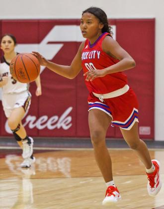 MOVINGFULLSPEED Naveah Martinez moving the ball full speed ahead against Paint Creek. | SHERI BATY PHOTO