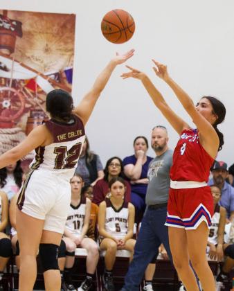THRILLING BASKETBALL Bailey Espinosa hits the THREE in last week’s thriller versus Paint Creek when Knox City came away with the win 29-25. | SHERI BATY PHOTO