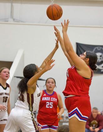 KNOCKINGITDOWN Audrey Perez knocks down 2 from the paint when the Knox City girls’basketball team opened their season last week. | SHERI BATY PHOTO