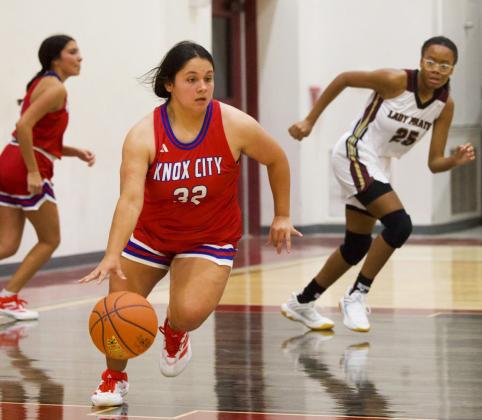 GRAB AND GO Miley Arrieta gets the grab and go for the Houndettes in last week’s back and forth thriller against the Lady Pirates. | SHERI BATY PHOTO