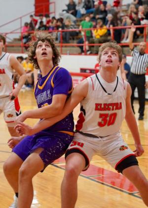 Talan Collins tries to get position for an offensive rebound. | PHOTOS BY LACI BOWMAN