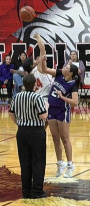 JUMP BALL IN THE CENTER CIRCLE The Lady Stangs put forth a valiant fight beginning the game with a jump ball in the center circle, looking for their first district win of the season. | COURTESY PHOTO