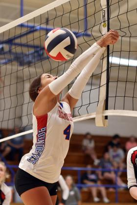Bailey Espinosa makes the save out of the net.