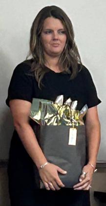 HIGH SCHOOL TEACHER OF THE YEAR Erin Yates, home economics teacher at Knox City High School, was honored at Region 9 ESC in Wichita Falls.
