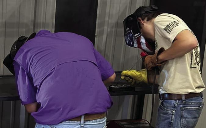 BENJAMIN IS WORKING HARD Benjamin high school students have been working hard to build welding booths in the ag shop. | COURTESY PHOTOS