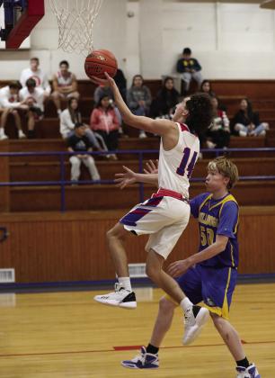 Jerry Grayson makes a two point bucket Sheri Baty/The Knox County News-Courier