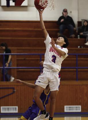Joe Adam Morelos scores two points with the lay up Sheri Baty/The Knox County News-Courier