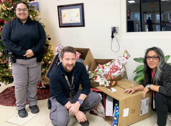 2025 AISD CHRISTMAS DONATIONS Bluebonnet Detention Center delivered Christmas gifts to six Anson ISD families. From left are a few of Santa’s hardworking “elves”: Admin Sgt. Marissa Rodriquez, IT Support Adam Snider andTraining Manager Jennifer Villanueva. | COURTESY PHOTO