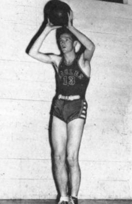 HOWARD (HOWIE) SHANNON, number 13 in a University of North Texas Eagles jersey, sets up for a shot in 1943. (https://texashistory.unt.edu/ark:/67531/ metadc271218/: accessed April 29, 2026), University of North Texas Libraries, The Portal to Texas History, https://texashistory.unt.edu; crediting UNT Libraries Special Collections