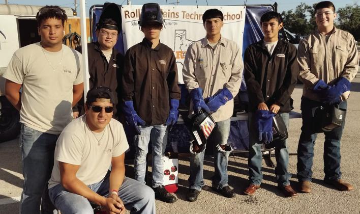 WORLDOFWORK RPTS students setting up in the Abilene Civic Center parking lot for the 2023World of Work Youth Expo in Abilene this past week. Back row: Trevor Henry, Justin Serrano, Billy Taylor, Nemo Silvas, Teagan Reyna, Logan Isbel. Front: Evan Enriquez. | COURTESY PHOTO