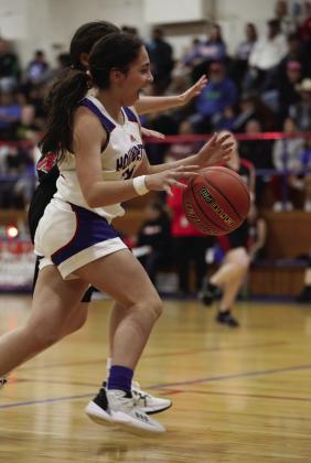 Bailey Castorena drives past the defense to score Sheri Baty/The Knox County News-Courier