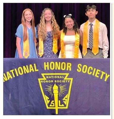 MUNDAY HIGH SCHOOL INDUCTS NEW MEMBERS The Munday High National Honor Society was pleased to induct four new members last week. The ceremony was held in the high school auditorium. The newest members are David Lewis, Rachel Hernandez, Loran Miranda, and Olivia Myers. These four students excel in character, leadership, academics, and service to their community. A reception was hosted by the current NHS members after the ceremony to honor the new members. | COURTESY PHOTO