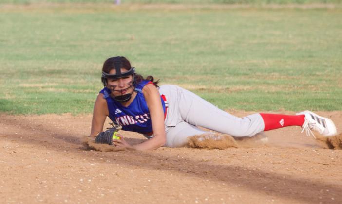 SNAGGED IT Bailey Espinosa dives for the out March 23. | SHERI BATY