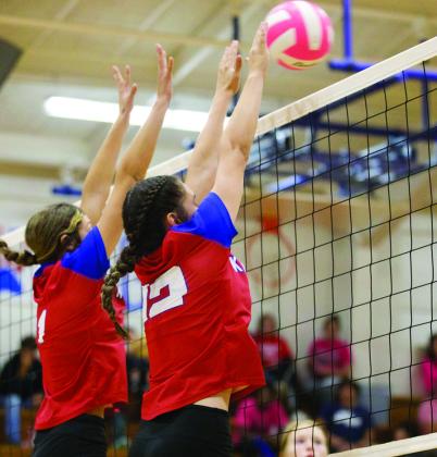 BLOCKED Jaden Baxter and Bailey Castorena make the block at the net. | SHERI BATY PHOTO