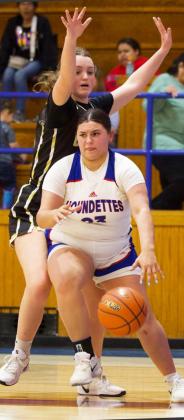 HUGGING THE BASELINE Houndette Aubrey Lerma hugs the baseline for the goal in Friday’s, Jan. 30 matchup against Crowell. The Lady Cats controlled the game from the opening tip. The Houndettes came up short and fell Crowell 63-43. | SHERI BATY PHOTO