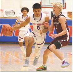 ON THE MOVE Knox City Hound Zander Abila is on the move to the hoop in last Friday’s win over Northside.The Hounds will host Munday Friday, Jan. 9 at 7:30 p.m. | SHERI BATY PHOTO