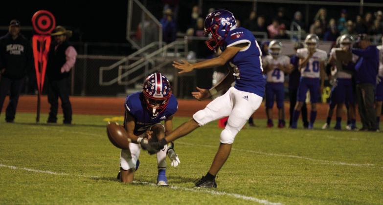 EXTRA POINT Saul Martinez puts the ball between the uprights for the PAT. | SHERI BATY PHOTO