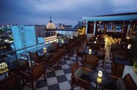 VIEWFROMROOFTOPTERRACE The view in the evening of Ho Chi Minh City from the outdoor terrace on the 9th floor of the Caravelle Saigon Hotel is memorable. | COURTESY PHOTO