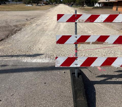 ROAD CLOSED A barrier blocking traffic from using Avenue F will soon give way to a brand new paved street, courtesy of a grant Knox City received in 2023 from the Texas Department of Agriculture. | TROY PARTON