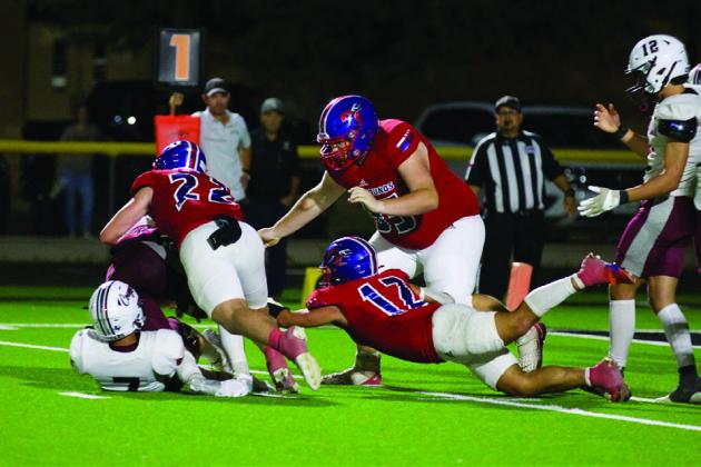 GREYHOUNDS GET THE W The Greyhounds faced the Klondike Cougars later that night in Jayton and brought home the win with the final score of Greyhounds 42 and Cougars 30. | SHERI BATY PHOTO