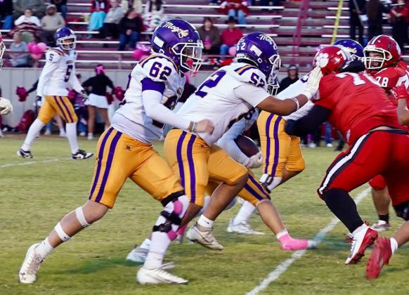 Offensive linemanTatum Hoffman and Amyas Ibarra make some room for the Mogul running back. Story and highlight photos, PAGE 5 | LACI BOWMAN