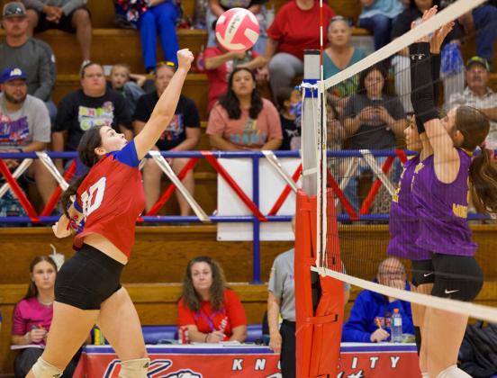 OVERTHE NET Knox City Houndette Savannah Friddle punches the ball over the net. The Houndettes would take the loss. | SHERI BATY PHOTO