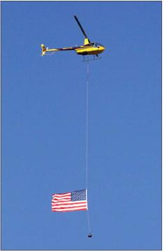 NEVER FORGET, ALWAYS REMEMBER On Wednesday, Sept. 11, 2024 Dustin Johnson of Cedar Ridge Aviation flew the American flag around Knox County. It was a poignant moment to document and encounter. | SHERI BATY PHOTO