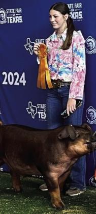 TEXAS STATE FAIR WINNERS Congratulations to John Cross Utley with his 4th place Duroc and Grayson Utley with her 8th place Duroc. | COURTESY PHOTOS