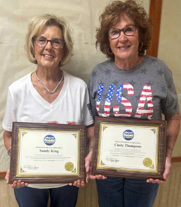 KEEPING MUNDAY BEAUTIFUL Residents Sandy King (left) and CindyThompson (right) received certificates of appreciation from Mayor Karen Longan for their commitment to making Munday a beautiful place to live. | NEWS-COURIER