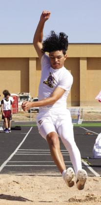 Munday at the long jump | SHERI BATY PHOTO