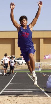 KCHS's Zander Abila takes flight at the long jump | SHERI BATY PHOTO