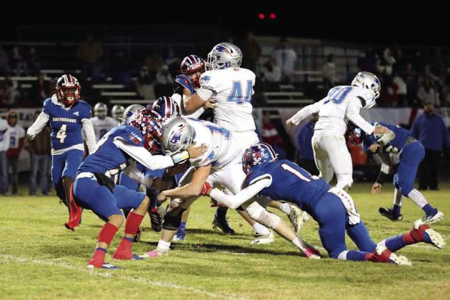 Greyhound defense, Bryson Callaway and Cameron Hernandez making the stop Sheri Baty/The Knox County News-Courier