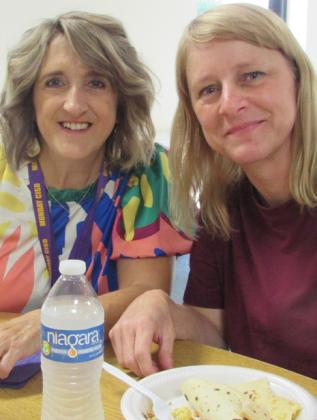 Teachers Mary Willison and Christie Shahan stayed to enjoy breakfast and fellowship with the church members and other teachers. | DON THOMPSON / NEWS – COURIER