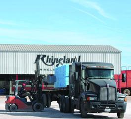 In Rhineland, Texas, ’tis the season for brightly wrapped bales and brightly shining church windows