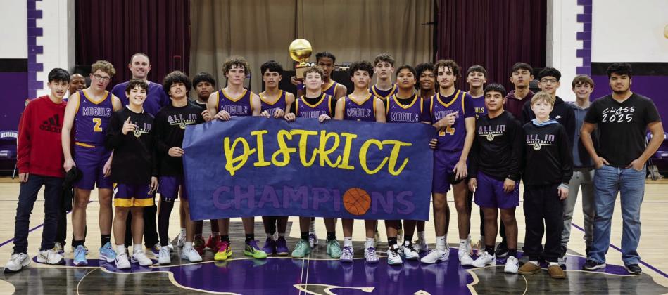 MIGHTY MOGULS The Munday boys sealed their district basketball championship Tuesday night with a perfect record, 11-0. | LACI BOWMAN PHOTO