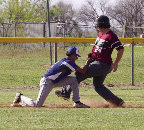 Joe Adam Morelos makes the tag at third for the out. | SHERI BATY PHOTO