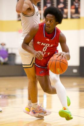 Devin Guillory drives passed the Crowell Wildcat defender. | SHERI BATY PHOTO