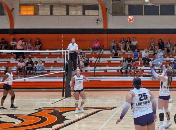 PATIENCE waiting to set up the return Benjamin volleyball came home with JH and HS wins at Paducah. | Courtesy Photo