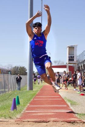 KNOX CITY’S Zander Abila powers his way to second place in the triple jump.