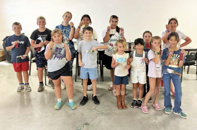 4-H SEWING CAMP The Knox County 4H Sewing Campers (below) tapped into their creative skills and created a woven bracelet and a sewn chapstick holder COURTESY PHOTO
