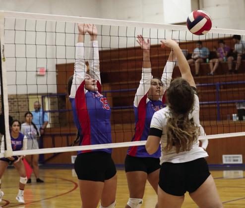 Sheri Baty/The Knox County News-Courier Callie Grimsley and Emilee Maynard with the block.