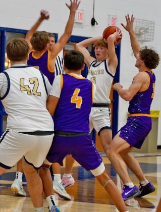 MOGULSFORCETURNOVER Luke Bowman and Haiden Bowman force a Pirate turnover during last week’s game against the Perrin-Whitt Pirates.