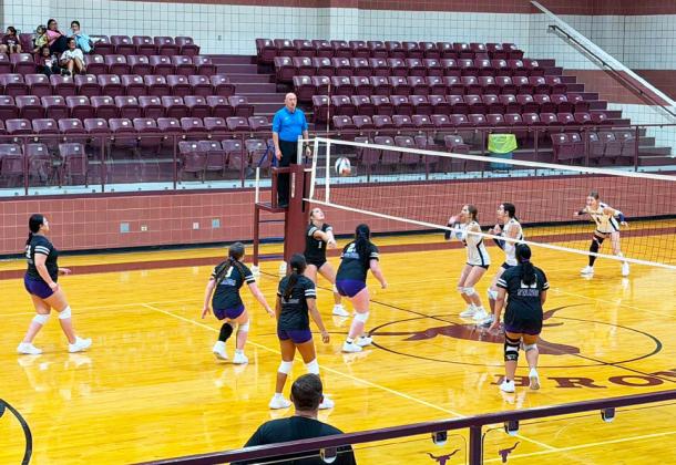 HUSTLE! GET TO THE BALL Benjamin Coach Cody Propps watches intently as the Lady Mustangs work to earn the point in Bronte.